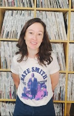 KMHD General Manager Meg Samples in the KMHD vinyl library.