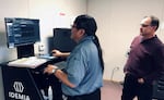 In this January 31, 2020 photo, members of the Hopi Tribe are being trained to use the TAP system to collect and submit sex offender information, access national crime information databases and submit sex offender registration records into the FBI's records.