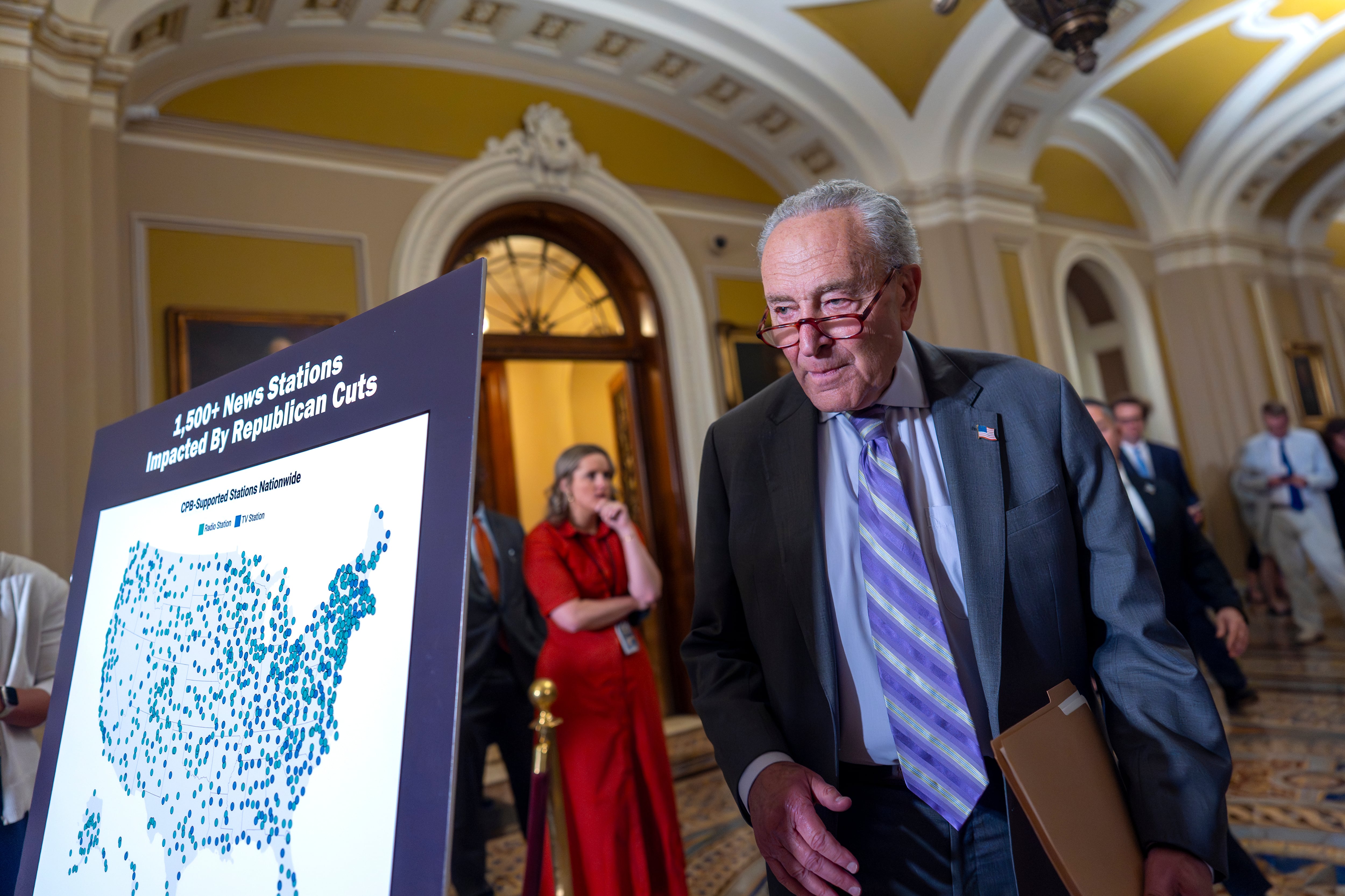 Senate Minority Leader Chuck Schumer, D-N.Y., arrives to speak with reporters about Senate Republicans' efforts to claw back $1.1 billion of funding authority from the Corporation for Public Broadcasting and about $8.3 billion from foreign aid programs targeted by DOGE, at the Capitol in Washington, Tuesday, July 15, 2025.