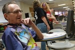 John "Coach" Fantini watches his team bowl during a Monday night league game at Allen's Crosley Lanes in Vancouver, Wash., on May 4, 2026. He's been coming to the bowling center since the 1960s, and says the bowling alley is "like a home."