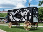 The Katastwóf Karavan is built from a steel frame mounted to lumber running gear with red oak and muslin wall panels, a propane ﬁred boiler, water tank, gas generator and a brass and steel 38-note steam calliope.