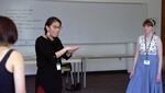 In this screenshot from a video produced by WK Productions, Johamy Morales from the Seattle Children's Theatre teaches students dance movements at the 2022 Stage the Change conference in Bend, Ore.