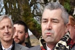 FILE- Multnomah County District Attorney Nathan Vasquez speaks at a press conference at Dawson Park in Portland, Ore., on March 19, 2025. Two former staffers of the DA's office have filed claims in court, signaling they plan to sue their former employer over claims of discrimination.
