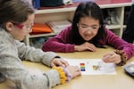 Students decide the turbidity of a water sample at Bridger K-8. 