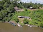 The solar boat and solar charging center at the Achuar village of Sharamentsa in Ecuador.