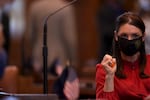 Oregon state Sen. Shemia Fagan, D-Portland, squeezes a stress-relief ball while waiting for the adoption of new rules during the second special of the Oregon State Legislature at the Oregon State Capitol in Salem, Oregon, on Monday, Aug. 10, 2020.