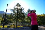 Johanna Varner stops at a roadside in Cascade Locks trying to get a view of her pika research sites in the Columbia River Gorge.