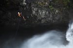 Ryan Scott rappels alongside 80-foot Final Falls, the last big drop before boaters exit the Salmon River Gorge.