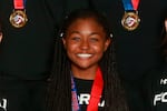 This April 28, 2019, image provided by USA Volleyball shows Amya Small at the USA Volleyball Girls 18s Junior National Championship at the Indiana Convention Center in Indianapolis. Small contemplated suicide in 2019 while a member of Oregon State's volleyball team, taking handfuls of over-the-counter medication before calling 911 seeking help. She had her scholarship pulled shortly after that incident and is planning on attending Florida A&M on scholarship this fall.