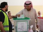 A Jordanian man votes in parliamentary elections at a polling station in al-Salt near the capital Amman on Tuesday.