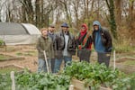 The garden congregation, from left, Kelly Sauskojus, Isaac Goodson, Chris Battle, Tiara-Lady Wilson and J.C. Carmichael pose for a portrait on Sunday, Nov. 12, 2022 at the Battlefield Farm in Knoxville, Tenn.