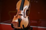 The Joachim-Ma Stradivarius violin is on display during a preview of the violin's auction at Sotheby's in New York City on Feb. 3. It sold for $11.3 million.