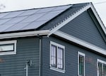 The rooftop solar array on a south-facing roof, at the home of Will Musser IV of Portland, Dec. 1, 2022. The single-family home has been retrofitted to reduce the family’s carbon footprint, and is equipped with solar panels, hybrid heat pump hot water heater, high-efficiency appliances and lighting, an electric vehicle charging station and a whole-home battery storage system.