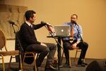 OPB Think Out Loud host Dave Miller offers author Mark Scatzker Doritos chips during their discussion on his new book 'The Doritos Effect.'