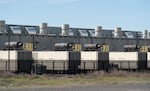 Generators and their exhaust pipes are visible outside of an Amazon data center in Umatilla, Ore., in April 2026.