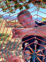 OSU engineering professor Chet Udell plays the SpiderHarp at Emerson Vineyards in August 2022 in Monmouth.