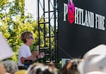 Portland Fire interim president Claire Hamill speaks to the crowd at the event.