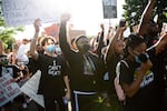 Protesters march through the streets to protest police brutality Wednesday, June 3, 2020, in Happy Valley, Ore.  Cities across the state including Happy Valley, Eugene, Hermiston, Pendleton, Burns, Grants Pass and others joined the nationwide cry for justice in the wake of George Floyd's death in Minnesota.