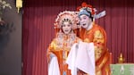 Yat Sing Chairperson Richard Kwong, right, and Vice-Chairperson Cindy Ng portray Prince Consort Zau Sai Hin and Princess Coeng Ping — tragic lovers from the late Ming dynasty who chose death over surrender to the Qing regime — during their performance of “The Flower Princess: The Fragrant Sacrifice” in Portland, Ore., on Aug. 24, 2024.