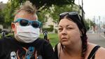 Deana Malone and her son Aiden Cope on a smoky day in Medford, Ore. Cope is sensitive to the smoke. The Red Cross has handed out more than 20,000 respirator masks.