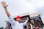 A person worships to Christian music at Rededicate 250, a mostly conservative Christian prayer gathering in honor of the United States' 250th anniversary, on the National Mall on Sunday.