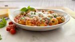 Ricotta gnudi with fresh tomato sauce brings summer to your table with just a few ingredients