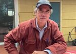 Sen. Jeff Merkley, D-Ore., sitting in the backyard of his southeast Portland home.