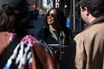 Keli McLoyd, director of the city’s overdose response unit, gives resources to community members in Southwest Philadelphia, Pa., on Feb. 26.