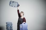 Digital producer Ann McGarry holds her 15 gallons of water like a true preparation champion.