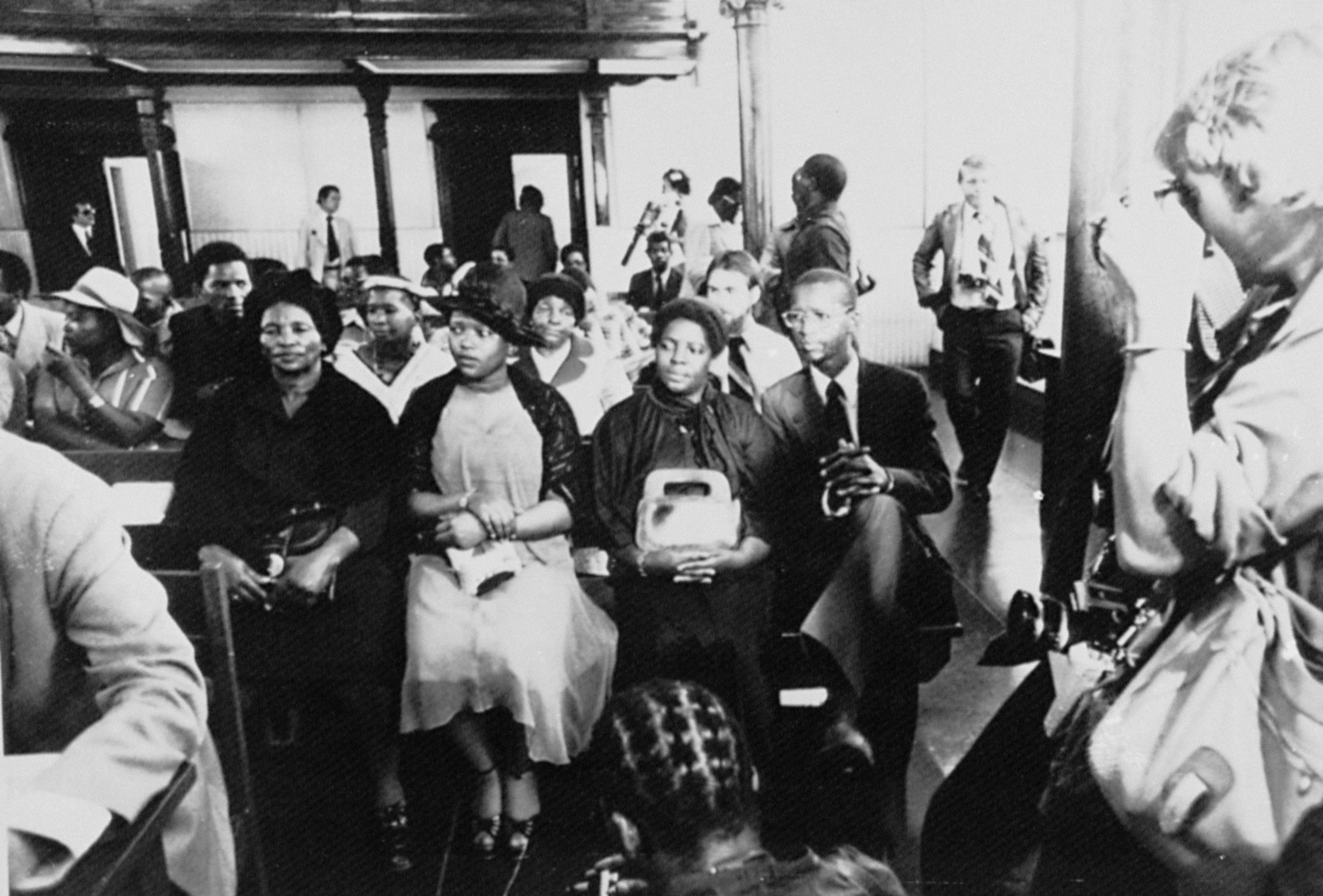 The family of Steve Biko, South African Black Consciousness leader, await the start of an inquest into his prison death in Pretoria, Nov. 14, 1977. From left to right: his older brother Kaya Biko; his widow Nontsikelelo Biko; his sister Nobanile Mvovo; and his mother, Alice Biko.