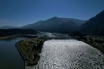 FILE - Water spills over the Bonneville Dam on the Columbia River, which runs along the Washington and Oregon state line, on Tuesday, June 21, 2022.