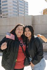 Sisters Olga Aguerra (left) and Nancy Tafolla stand outside the Sandra Day O'Connor Courthouse after Aguerra became a U.S. citizen.