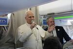 Pope Leo XIV talks to journalists aboard the papal flight from Rome to Madrid on June.
