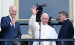 In this Sept. 24, 2015 file photo, Pope Francis, flanked by Vice President Joe Biden and House Speaker John Boehner of Ohio, waves to the crowd on Capitol Hill in Washington as they stand on the Speaker's Balcony on Capitol Hill, after the pope addressed a joint meeting of Congress inside.