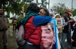 Two women embrace and weep during a demonstration in Poza Rica on Feb. 21. Approximately 300 people participated in the fifth National Missing Persons Search Brigade in the city.