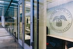 A closed entrance to the Social Security Administration headquarters sits empty in Woodlawn, Md., on March 20.