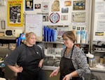 Owner Karen Carlton, right, speaks with her associate behind the counter at Joe Brown's Cafe in Vancouver, Wash., on Sept. 27, 2026.