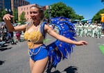 Members of Portland Samba dance through the streets of downtown Portland.