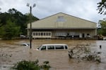 Heavy rains from Hurricane Helene caused record flooding and damage on September 28, 2024 in Asheville, North Carolina.