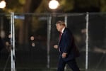 President Donald Trump walks on the Ellipse as he arrives on Marine One near the White House, Friday, Aug. 21, 2026, in Washington.
