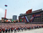 In this pool photograph distributed by the Russian state agency Sputnik, people release balloons in the air as Vladimir Putin and Kim Jong Un attend a welcoming ceremony at Kim Il Sung Square in Pyongyang on June 19. Putin enjoyed a red carpet welcome, a military ceremony and an embrace from North Korea's Kim Jong Un during the state visit.