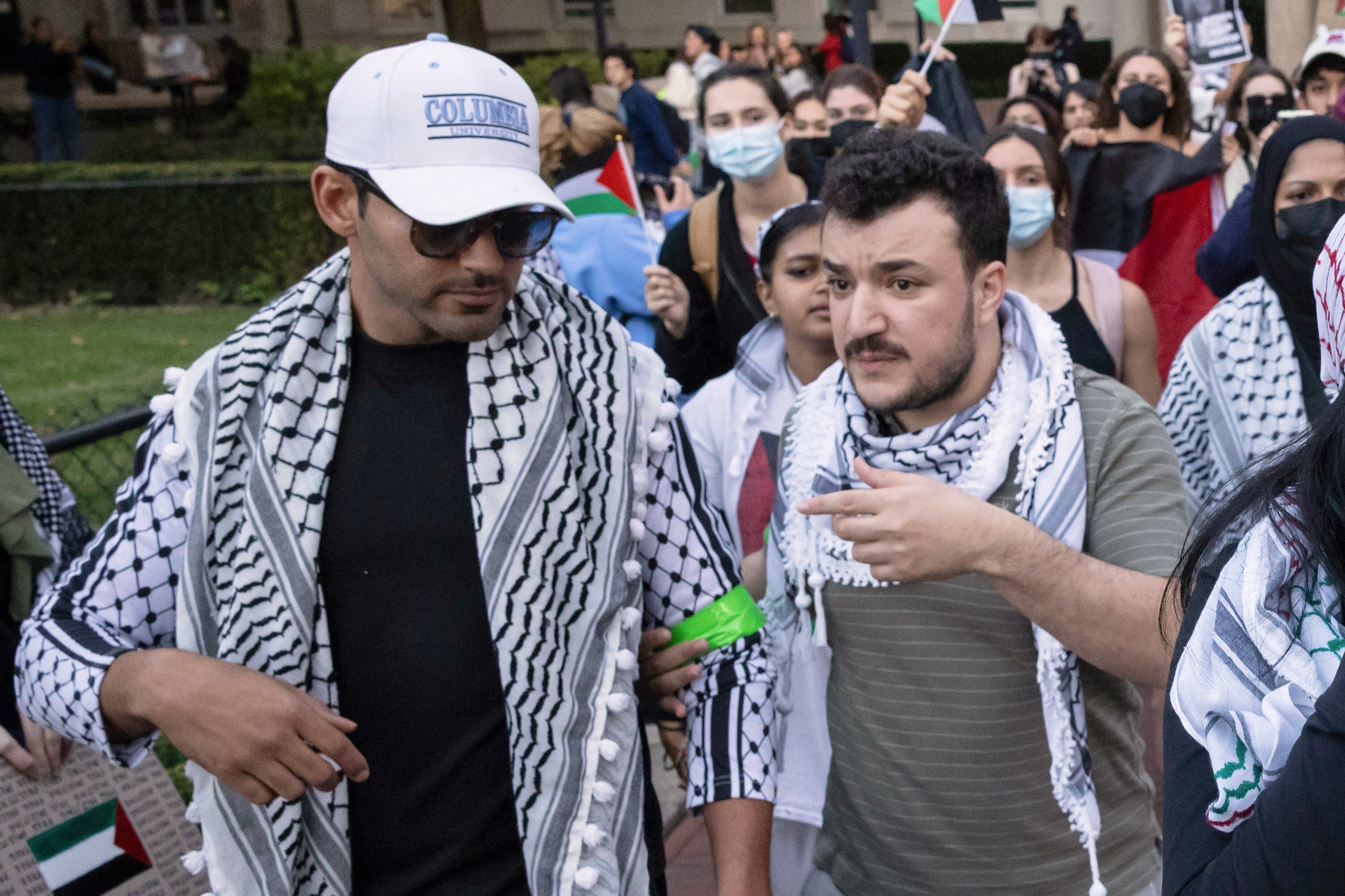 Mohsen Mahdawi (left) and Mahmoud Khalil participate in a pro-Palestinian protest at Columbia University in New York City on Oct. 12, 2023.