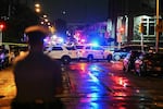 Police work the scene of a July 3 shooting in the Kingsessing section of Philadelphia.