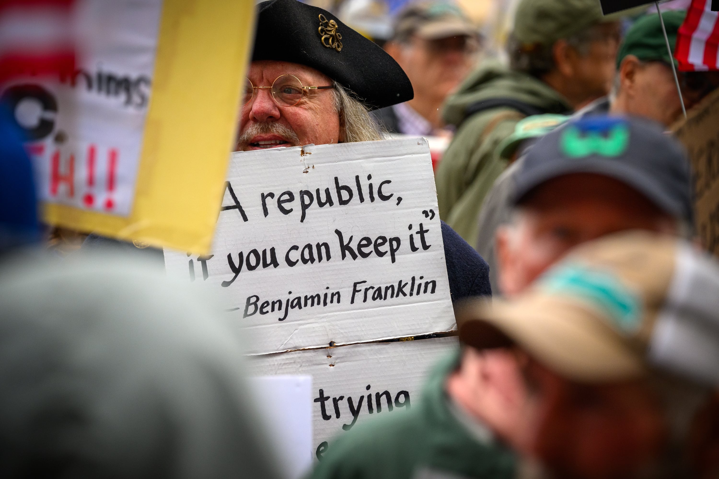 Hartford, Ct.: A person wearing a twi-corner hat and spectacles resembling those affiliated with Benjamin Franklin.