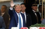 Former President Donald Trump leaves Trump Tower on April 13 in New York City. A trial is set to begin Monday over allegations that Trump and his associates, including some of his children, committed fraud to do business.