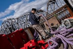 Second year student Domenico Aditama coils ropes at one of Cascadia Tech Academy’s satellite locations in Vancouver, Wash., on Aug. 27, 2026. The Maritime Technology program is currently in its second year. 