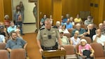 Douglas County Sheriff John Hanlin addresses the public during a tense Douglas County Commissioners meeting on July 22, 2026.