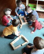A group of children play with blocks at Wonders Early Learning Center in Corvallis, The child care center closed in mid-March 2020, at the same time public schools closed due to the coronavirus pandemic.