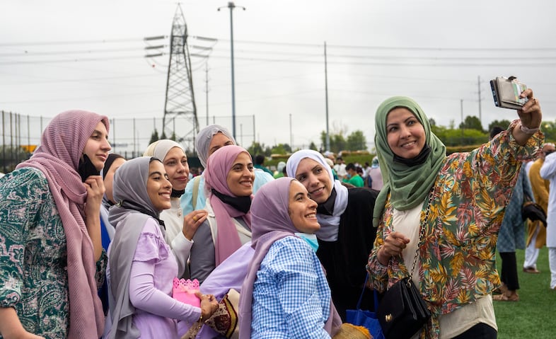 Keifah Sayed (far right) takes a selfie with friends and family to capture the celebration for EId Al-Adha.