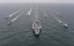 South Korean and U.S. Navy vessels steam in formation during a joint naval exercise in international waters off South Korea's southern island of Jeju at an undisclosed location on April 4, 2023.